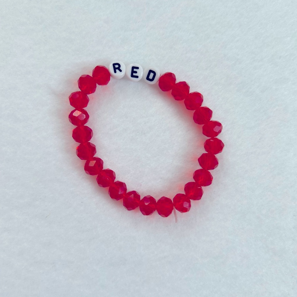 a red taylor swift bracelet!